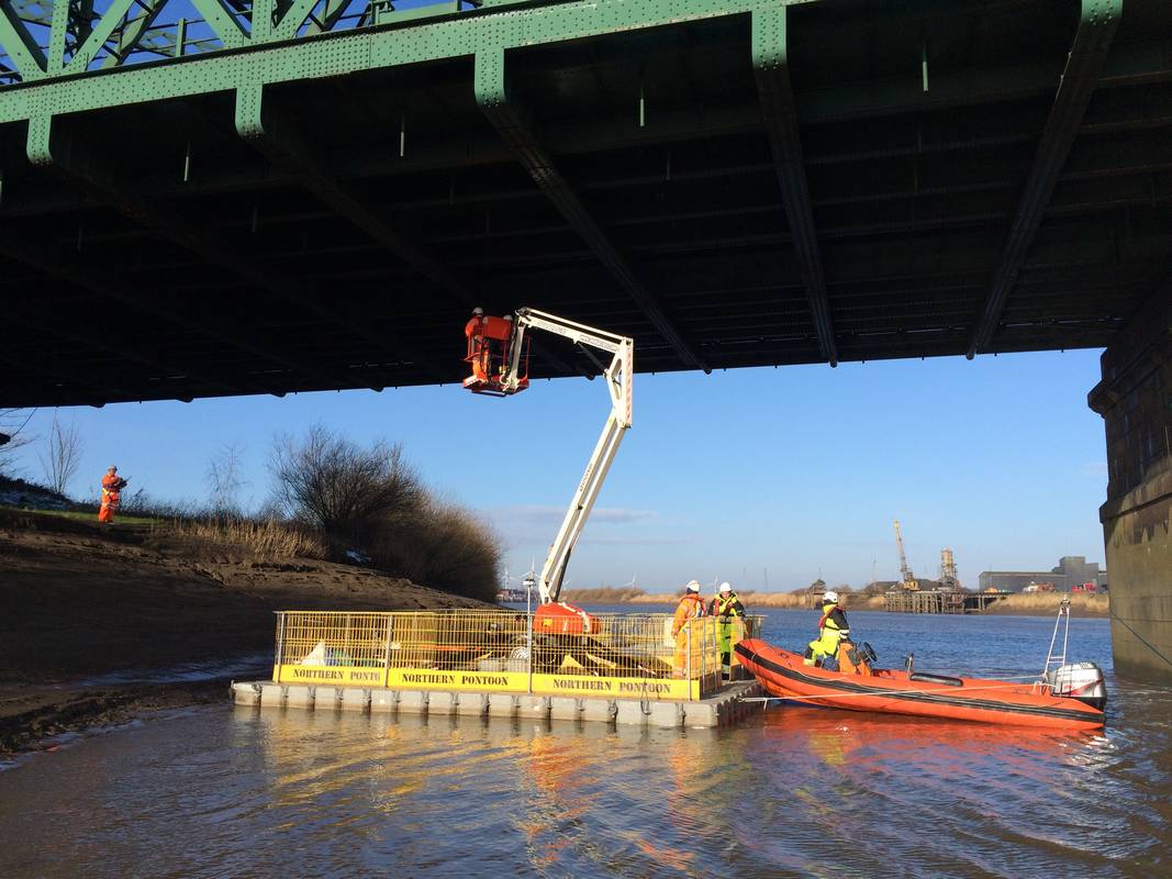 floating platform under bridge for repair